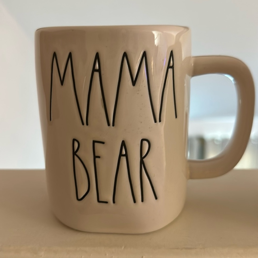 Three pink Rae Dunn mugs.